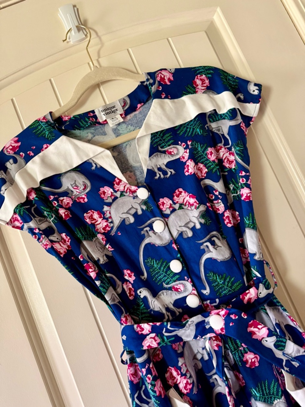 'Unique Vintage' Blue Dinosaur Print Swing Dress with Pink Accents